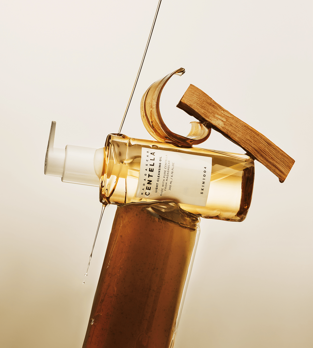 A serene and elegant woman enjoys a skincare ritual, enhancing her natural beauty in the comfort of her home.